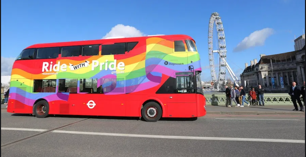 A rainbow double-decker bus in London celebratingLGBTQ+ pride.